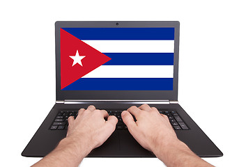 Image showing Hands working on laptop, Cuba