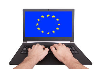Image showing Hands working on laptop, European Union