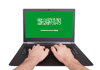 Image showing Hands working on laptop, Saudi Arabia