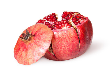 Image showing Broken Bright Ripe Juicy Pomegranate With Lid Near