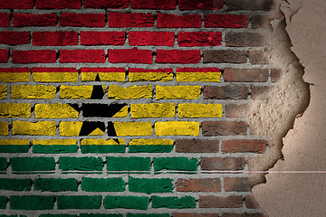 Image showing Dark brick wall with plaster - Ghana