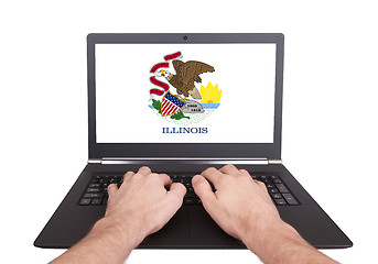 Image showing Hands working on laptop, Illinois