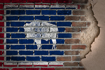 Image showing Dark brick wall with plaster - Wyoming