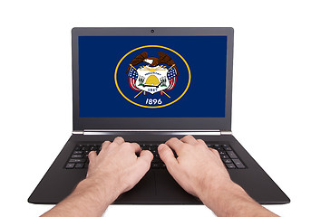 Image showing Hands working on laptop, Utah