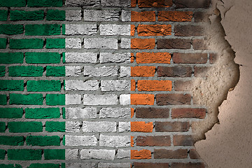 Image showing Dark brick wall with plaster - Ireland