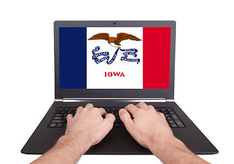 Image showing Hands working on laptop, Iowa