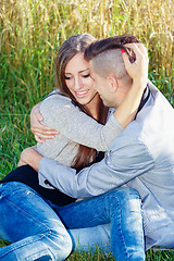 Image showing Happy smiling young couple outdoor. valentine concept