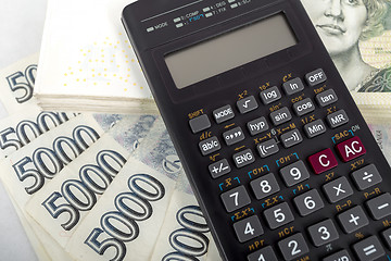 Image showing Czech money banknotes and calculator