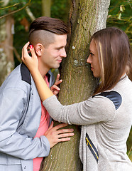 Image showing Happy smiling young couple outdoor. valentine concept