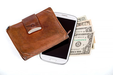 Image showing cellphone and money on white