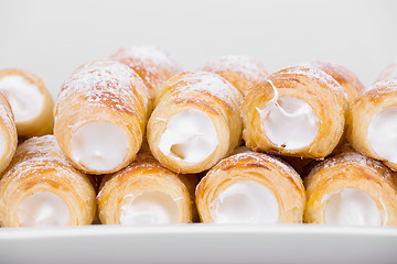 Image showing tube of pastry filled with snow