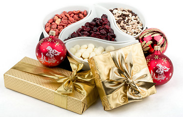 Image showing christmas decoration and golden box with ribbon