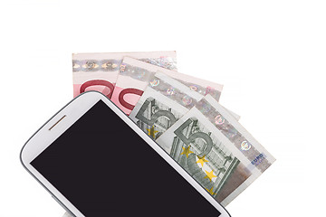 Image showing cellphone and money on white