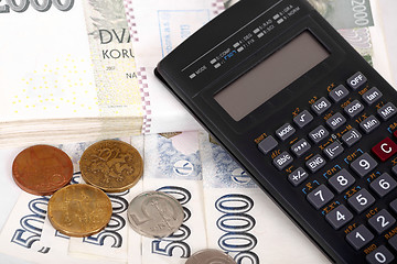 Image showing Czech money banknotes, coins and calculator