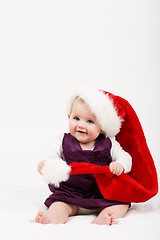 Image showing Child girl with Christmas santa hat