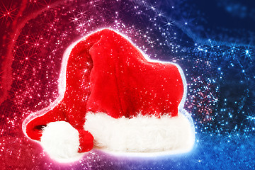 Image showing red santa hat on abstract background