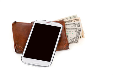 Image showing cellphone and money on white