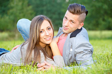 Image showing Happy smiling young couple outdoor. valentine concept