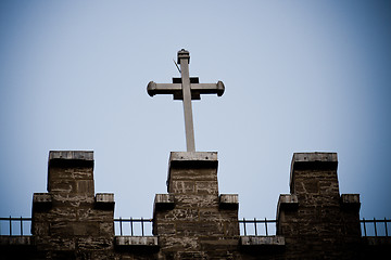 Image showing Christian crucifix cross on a rooftop