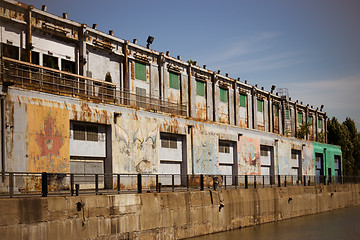 Image showing Old grungy warehouse on a pier