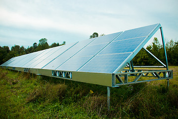 Image showing Solar energy panels in a farmer's field