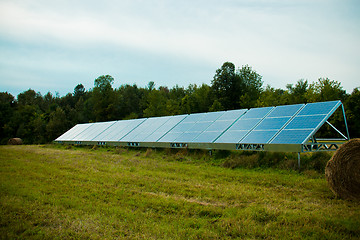 Image showing Solar energy panels in a farmer's field