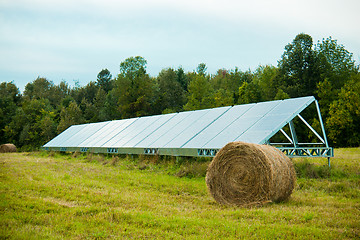 Image showing Solar energy panels in a farmer's field