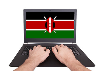 Image showing Hands working on laptop, Kenya