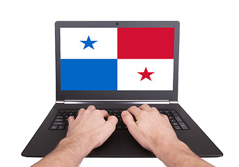 Image showing Hands working on laptop, Panama