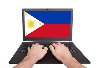 Image showing Hands working on laptop, Philippines