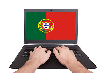 Image showing Hands working on laptop, Portugal