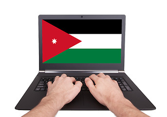 Image showing Hands working on laptop, Jordan