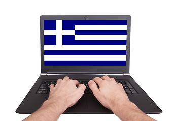 Image showing Hands working on laptop, Greece