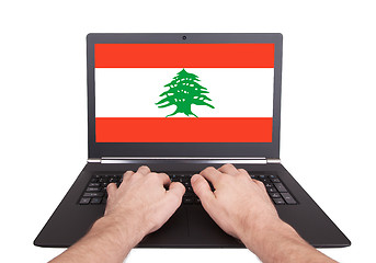 Image showing Hands working on laptop, Lebanon