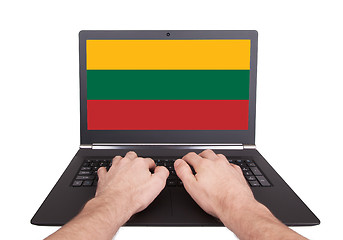 Image showing Hands working on laptop, Lithuania