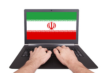 Image showing Hands working on laptop, Iran