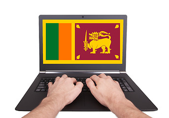 Image showing Hands working on laptop, Sri Lanka