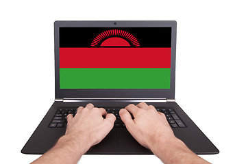 Image showing Hands working on laptop, Malawi