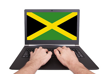 Image showing Hands working on laptop, Jamaica