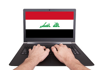 Image showing Hands working on laptop, Iraq