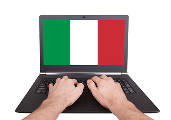 Image showing Hands working on laptop, Italy