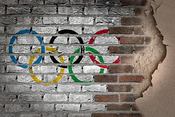 Image showing Dark brick wall with plaster - Olympic rings