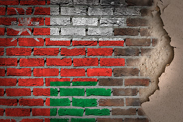 Image showing Dark brick wall with plaster - Oman