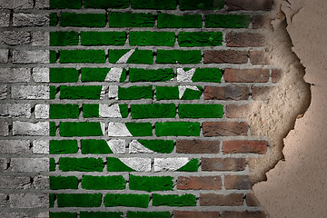 Image showing Dark brick wall with plaster - Pakistan