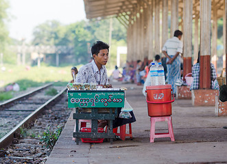 Image showing Vendor at a railway station in Yangon, Myanmar.