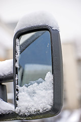 Image showing snowhat on a car mirror