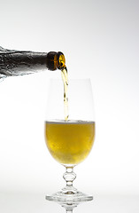 Image showing Pouring the beer