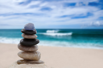 Image showing Pile of pebbles at the beach