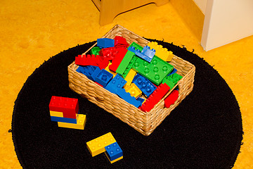 Image showing Plastic toys in box a childrens room ready to play with