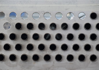 Image showing Metal plate with holes and pipes